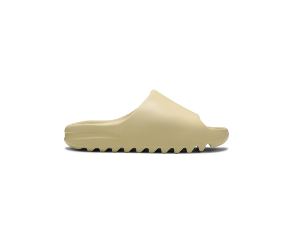 Yeezy Slide Resin Yeezy Slide Resin w odcieniu Resin, wykonane z pianki EVA dla wygody.
