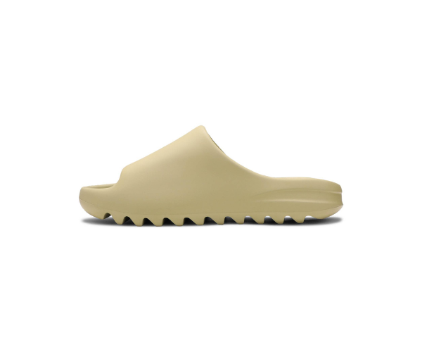 Yeezy Slide Resin Yeezy Slide Resin w odcieniu Resin, wykonane z pianki EVA dla wygody.